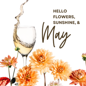 flowers on the bottom, white wine being poured into a glass. 